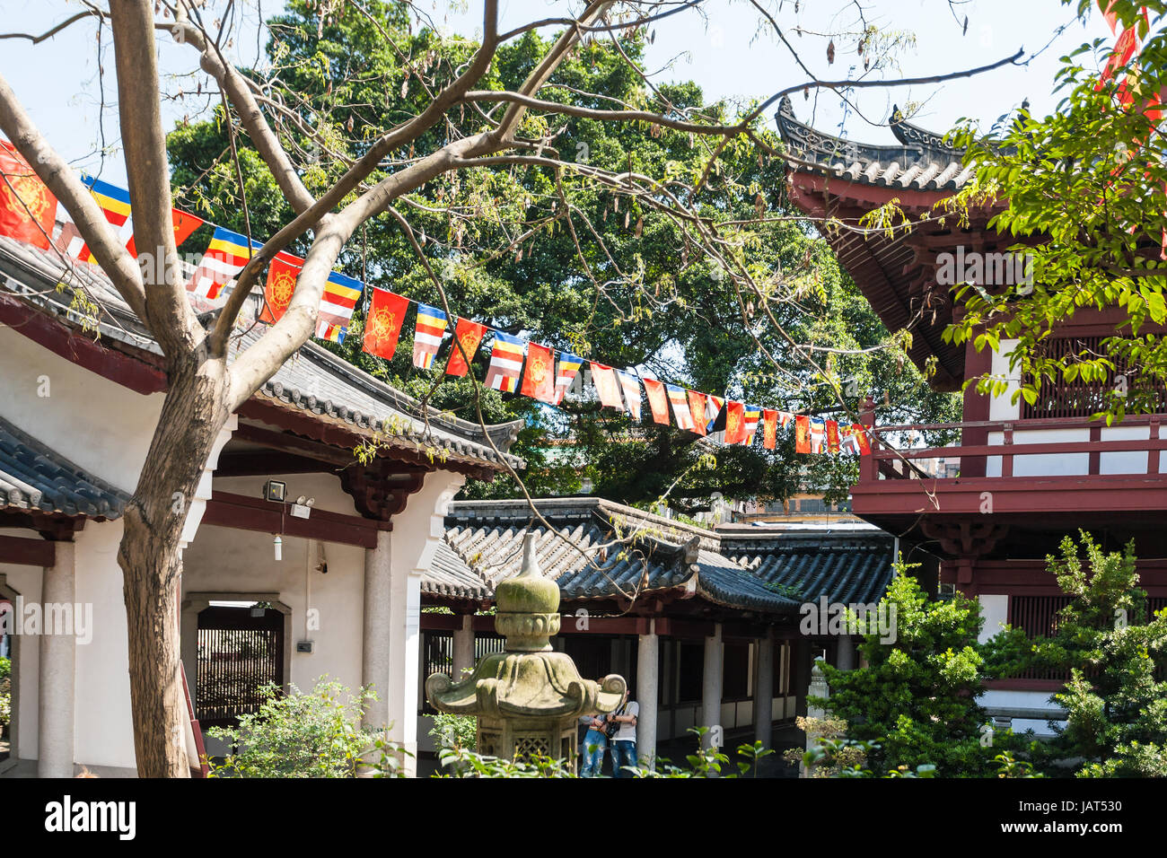 GUANGZHOU, CHINA - APRIL 1, 2017: green garden in court of Guangxiao Temple (Bright Obedience, Bright Filial Piety Temple). This is is one of the olde Stock Photo
