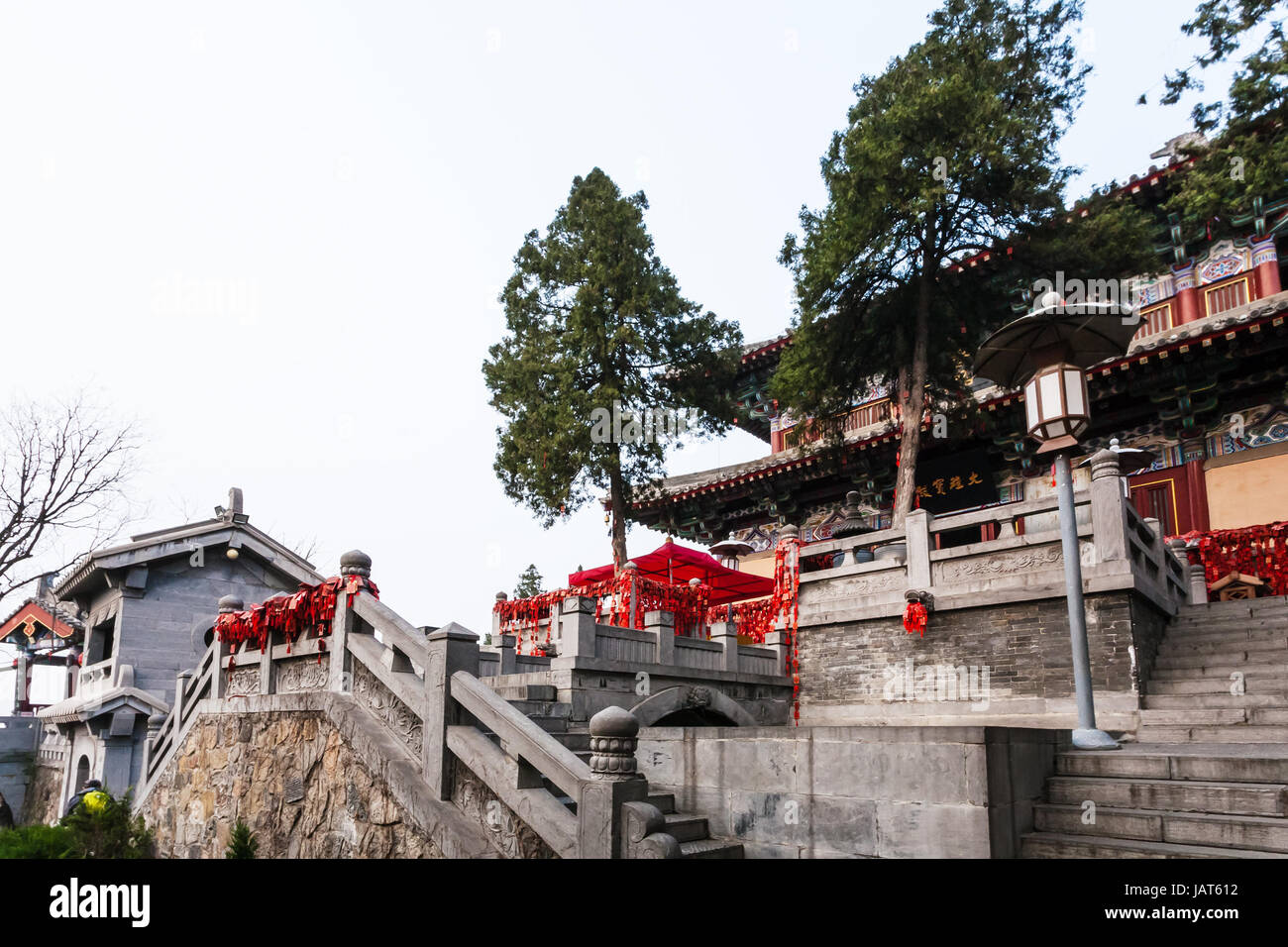 LUOYANG, CHINA - MARCH 20, 2017: buildings of Xiangshan Temple on East Hill of Buddhist monument Longmen Grottoes in spring. The complex was inscribed Stock Photo