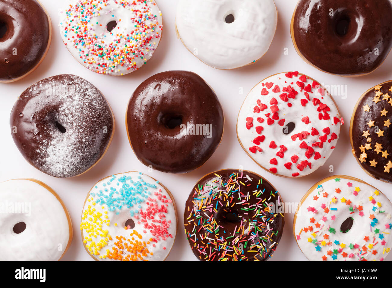 Colorful donuts closeup. Top view Stock Photo - Alamy