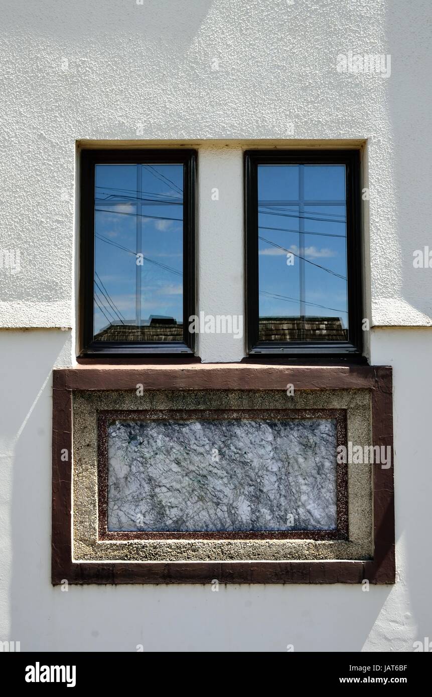 Grey wall blue sky hi-res stock photography and images - Alamy
