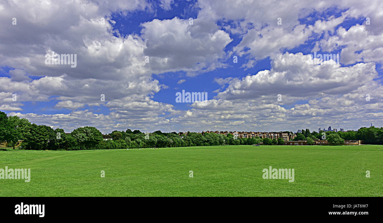 Highgate and Greater London from Parliament Hill Fields in Hampstead Heath under a vast cloudscape. Stock Photo