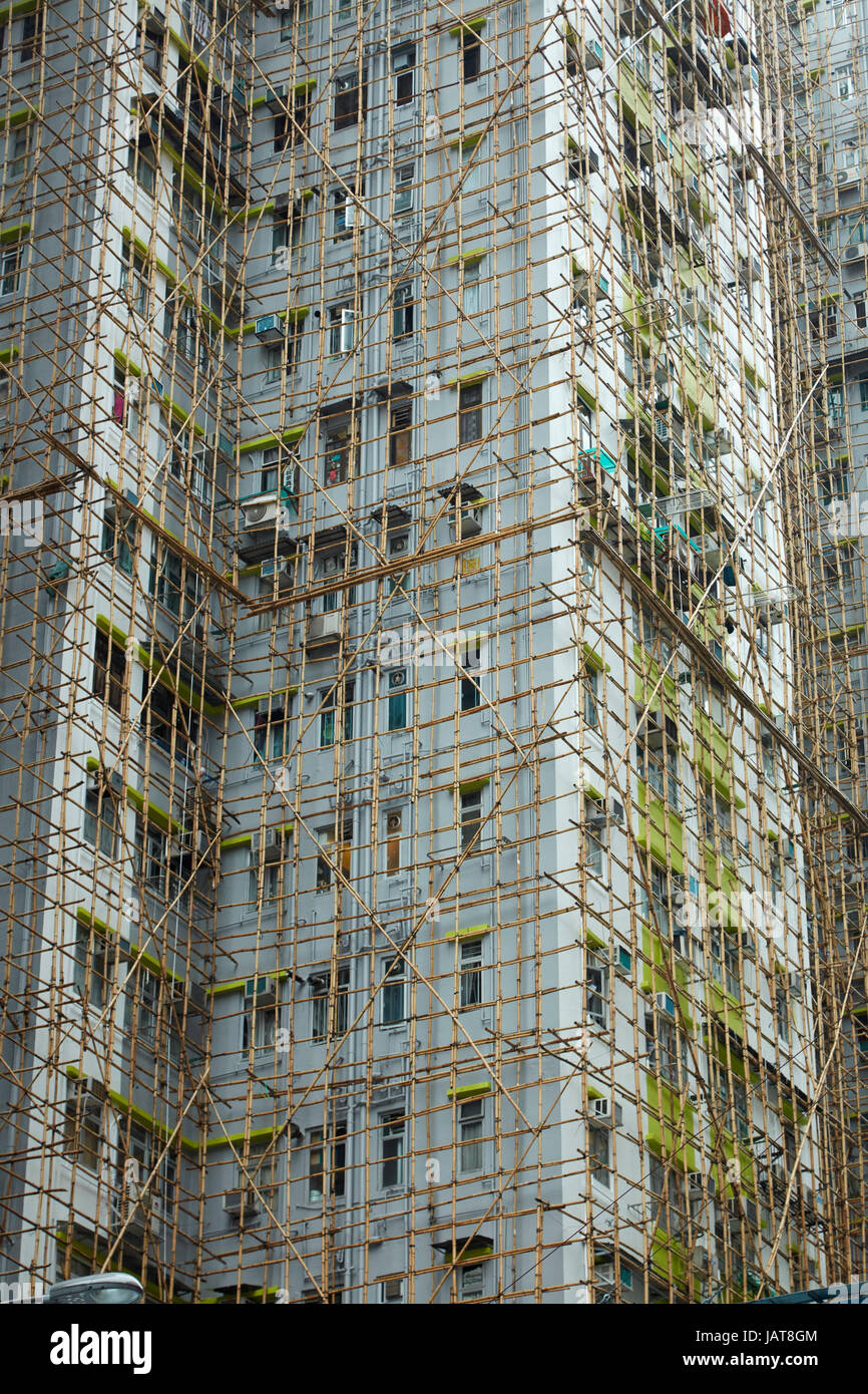 Bamboo scaffolding on high-rise apartment building, Kowloon, Hong Kong, China Stock Photo