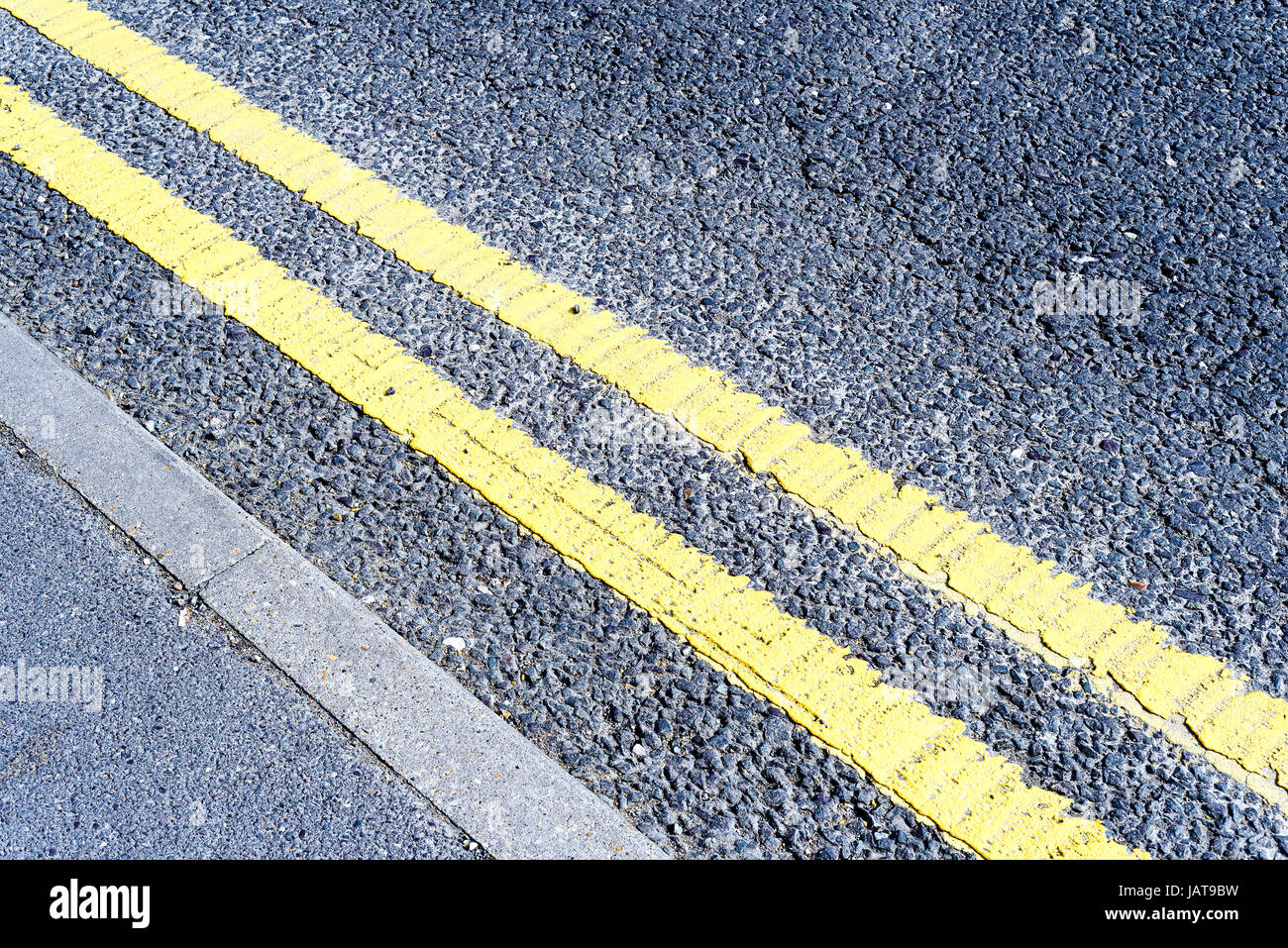 Yellow no parking sign painted hi-res stock photography and images - Alamy
