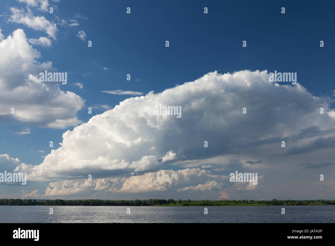 Landscape with river and cloudy sky. Sunny summer scene Stock Photo - Alamy