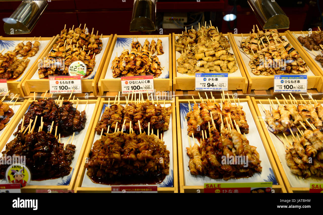 Yakitori and other Japanese grilled meat on skewers on display in a Yakitori shop in Aomori