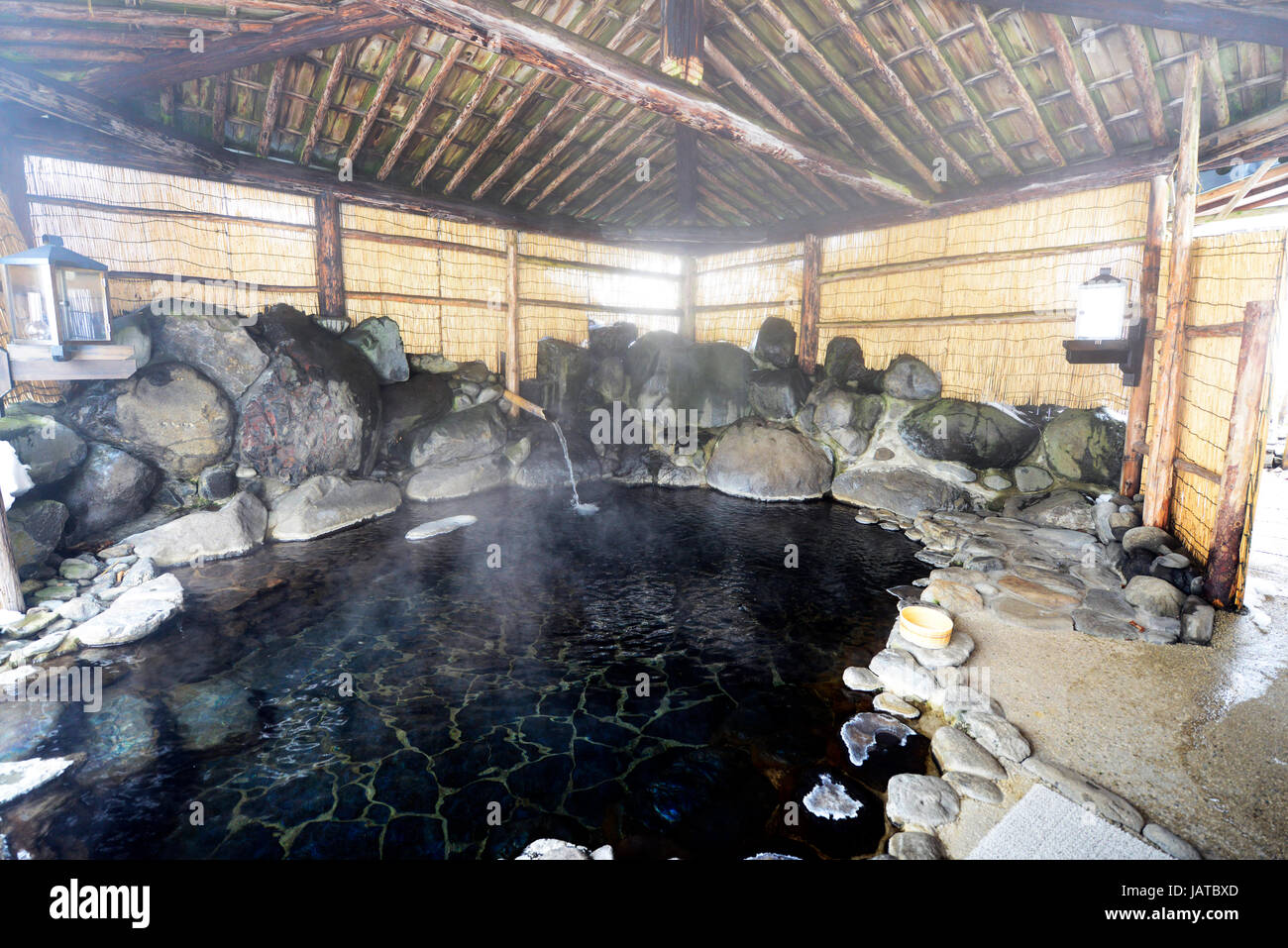 An outdoor hot springs pool ( Rotenburu ) in Aoni Onsen in Aomori prefecture. Stock Photo
