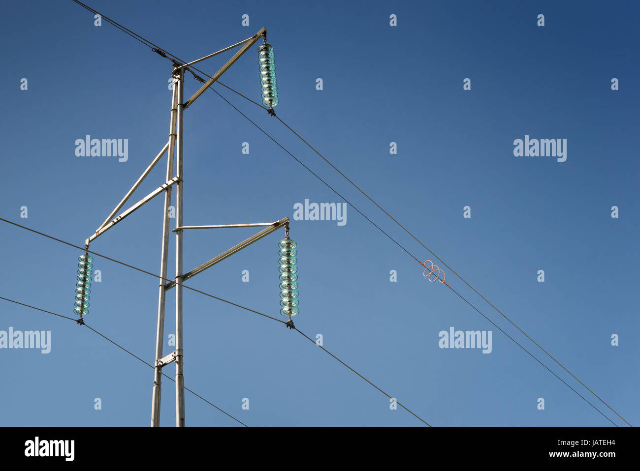 Simple electricity pylon with wires and insulators Stock Photo