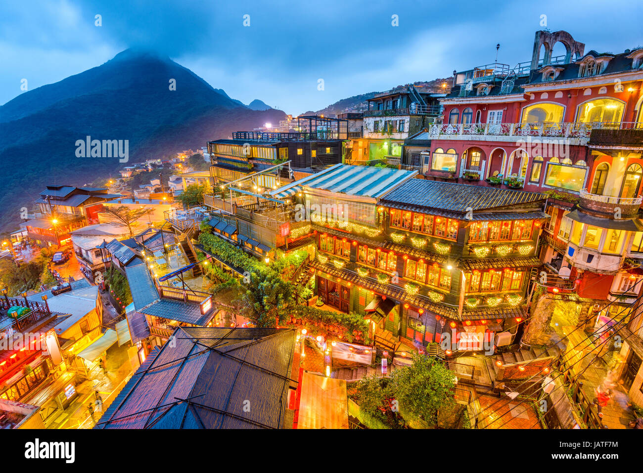Jiufen, Taiwan hillside with old teahouses at dusk. Stock Photo