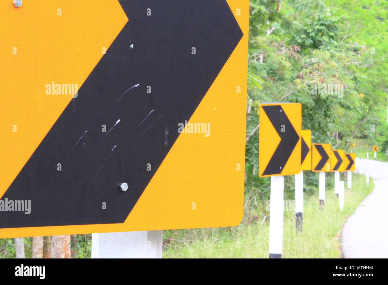 Dangerous turns, warning traffic sign isolated on white background Stock  Photo - Alamy