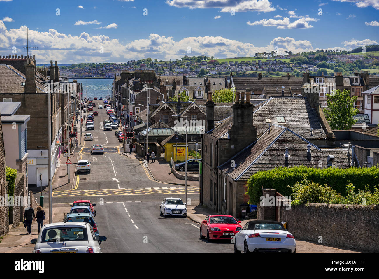 View down main street in Broughty Ferry with River Tay in background