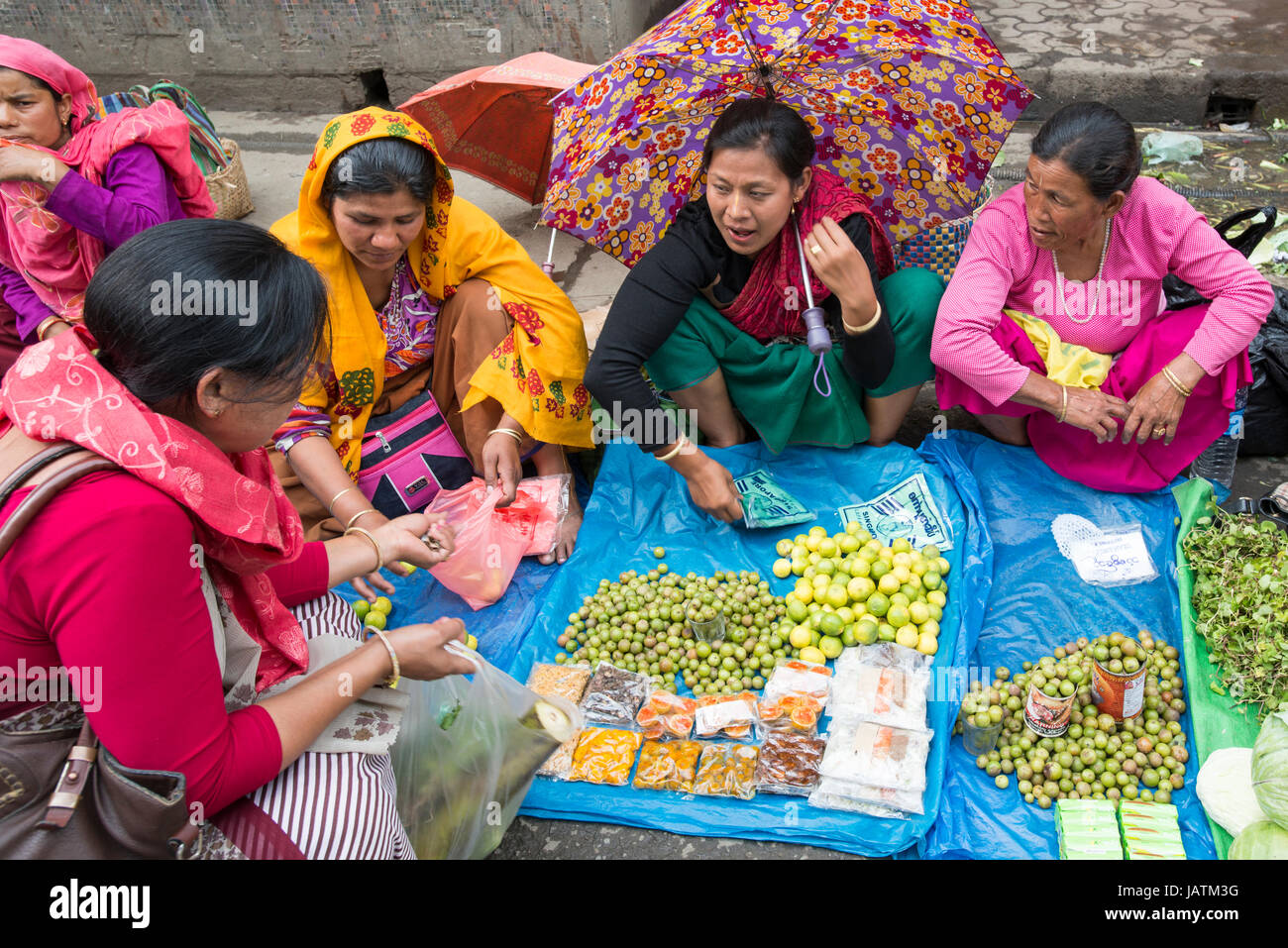 Market traders sell fruit from a street fly pitch in Imphal, Manipur, India  Stock Photo - Alamy