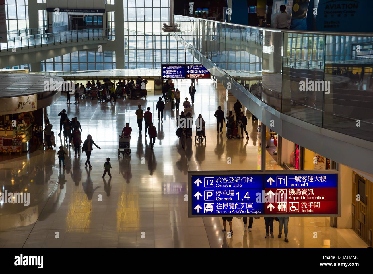 Hong Kong, China, 28th February 2015. Passengers walking in Hong-Kong Chek Lap Kok Airport. Stock Photo