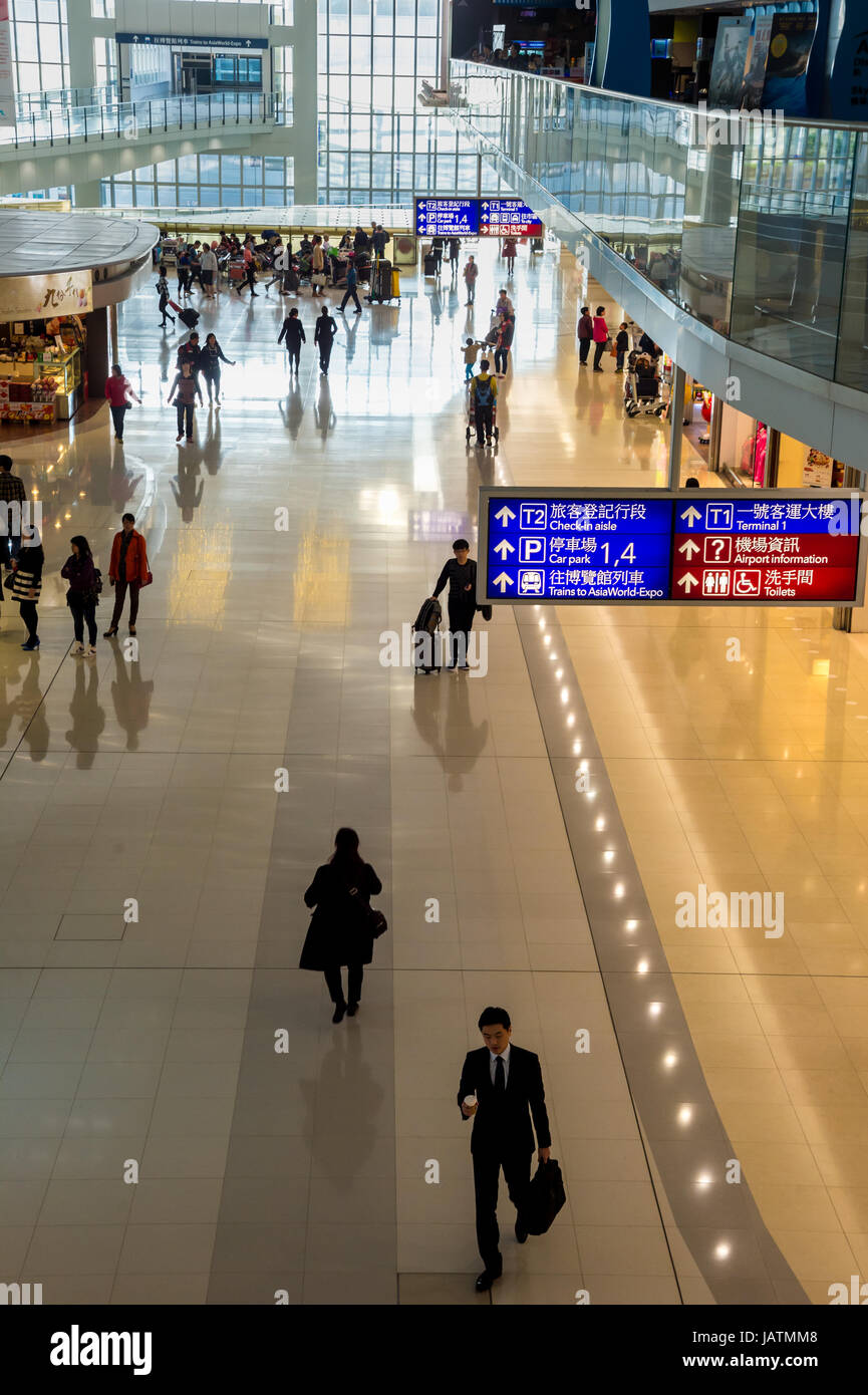 Hong Kong, China, 28th February 2015. Passengers walking in Hong-Kong Chek Lap Kok Airport. Stock Photo