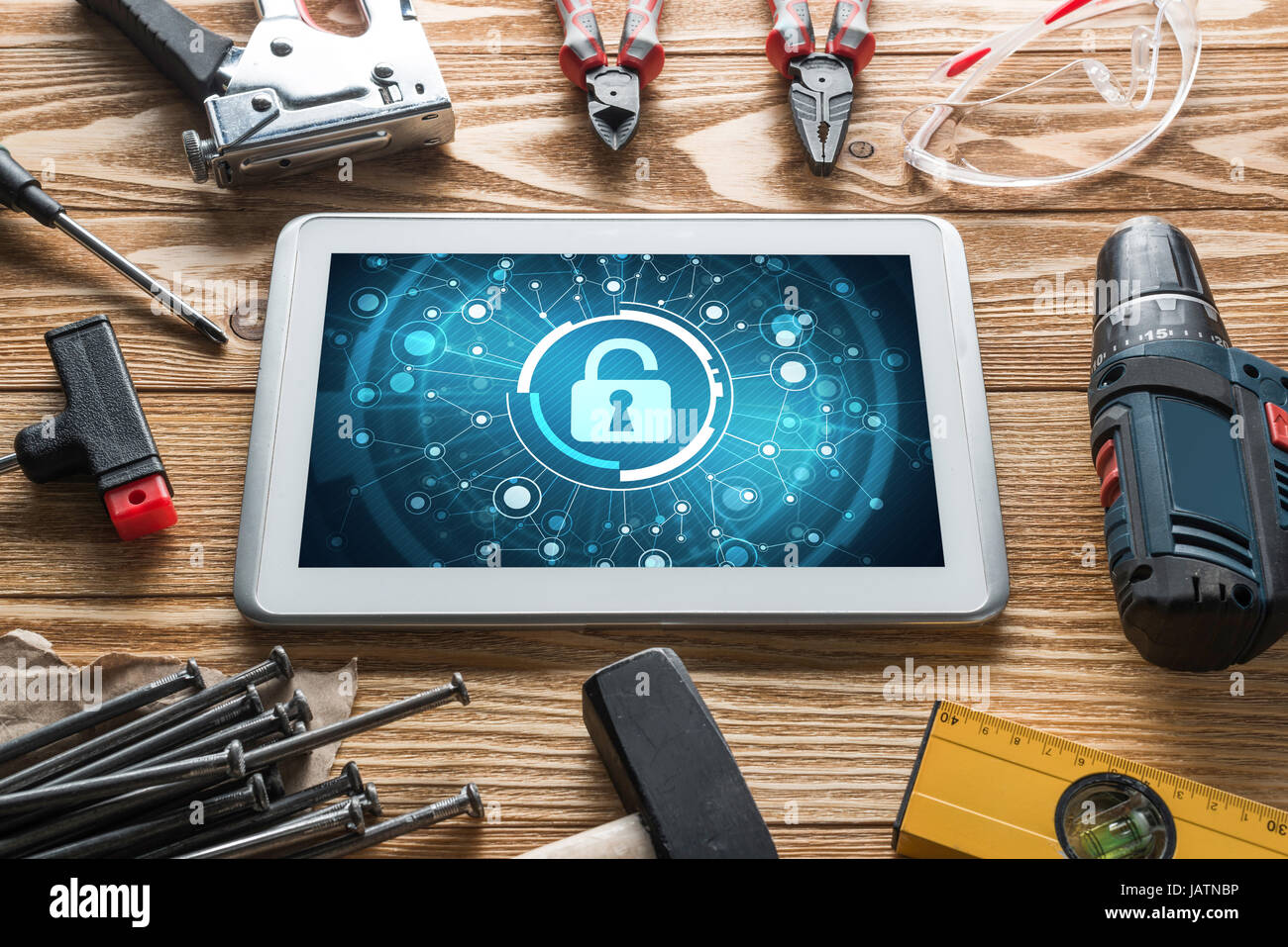 Web security and technology concept with tablet pc on wooden table ...