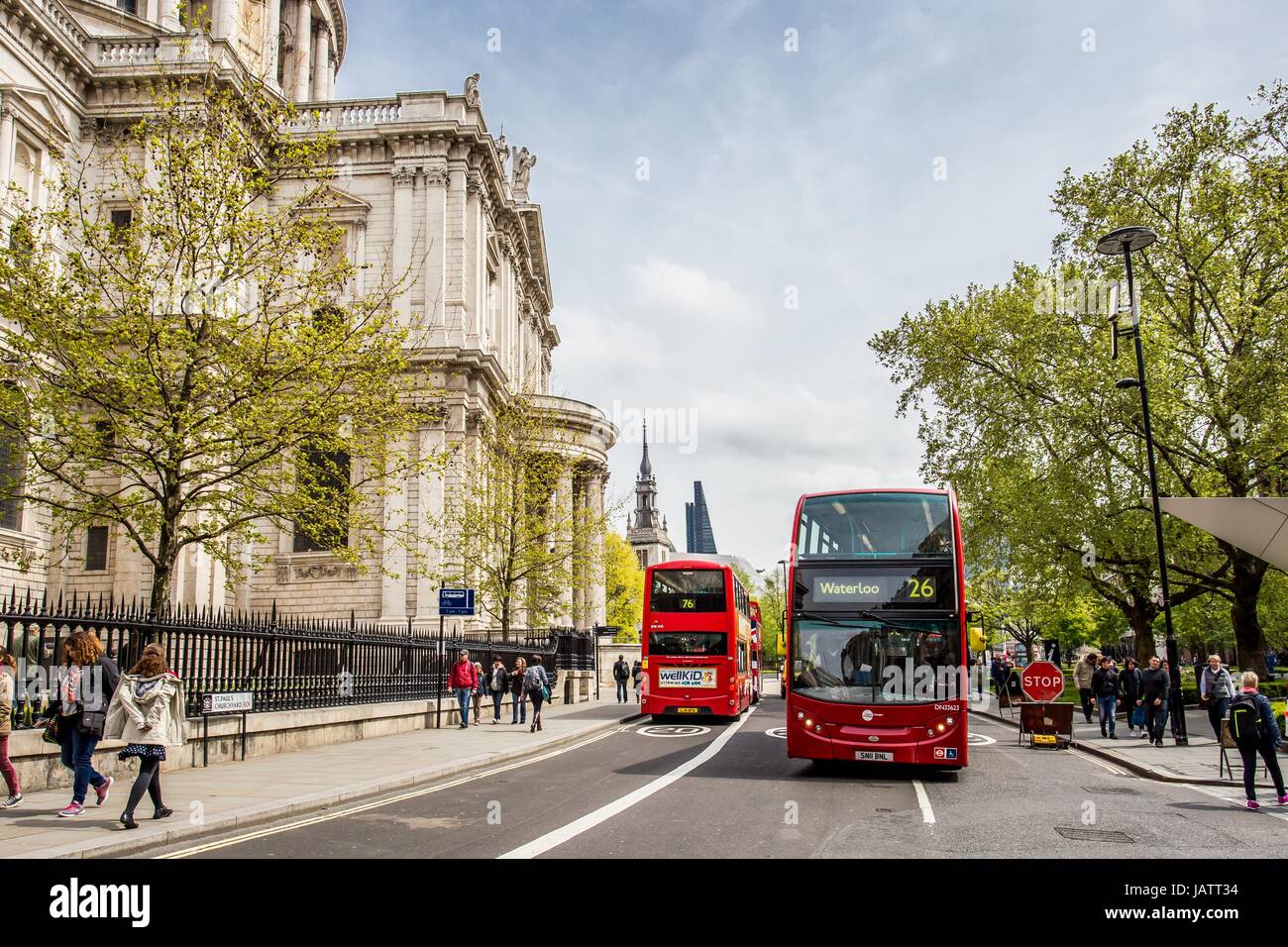 red bus in front of st pauls cathedral london Stock Photo