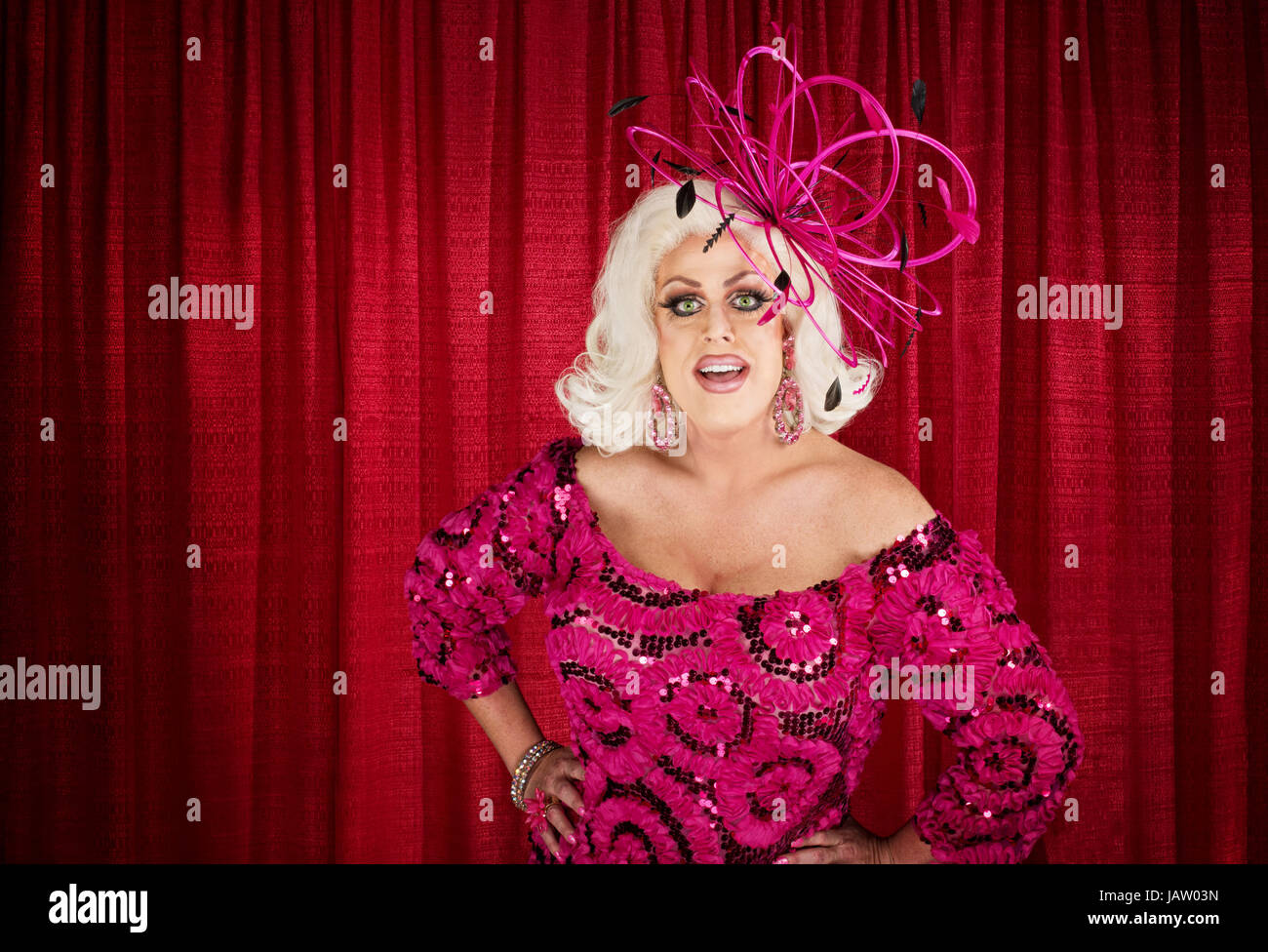 Blond drag queen with hands on hips Stock Photo