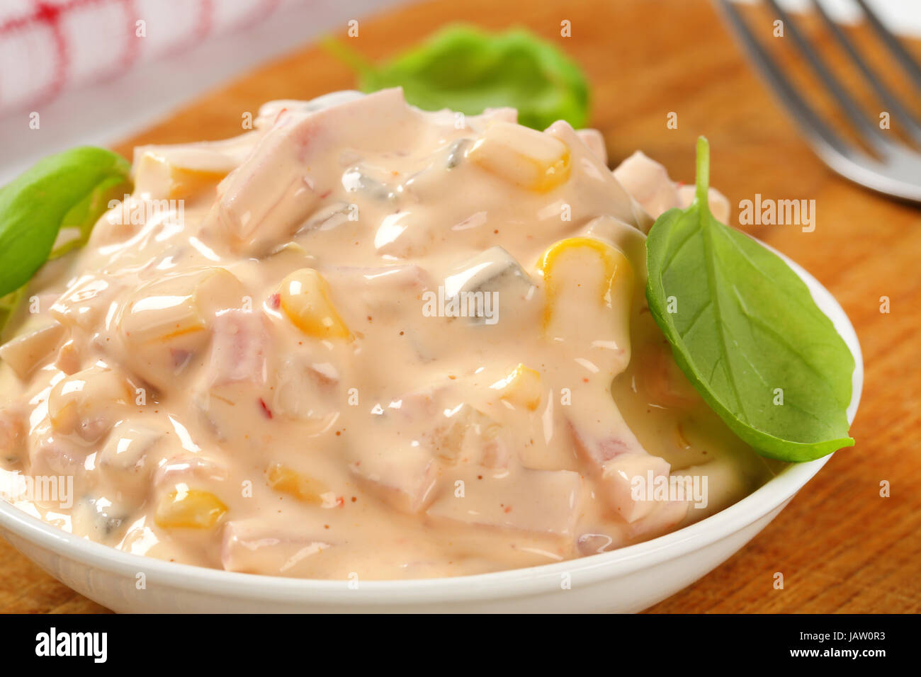 Ham salad dressed with paprika yogurt sauce Stock Photo Alamy