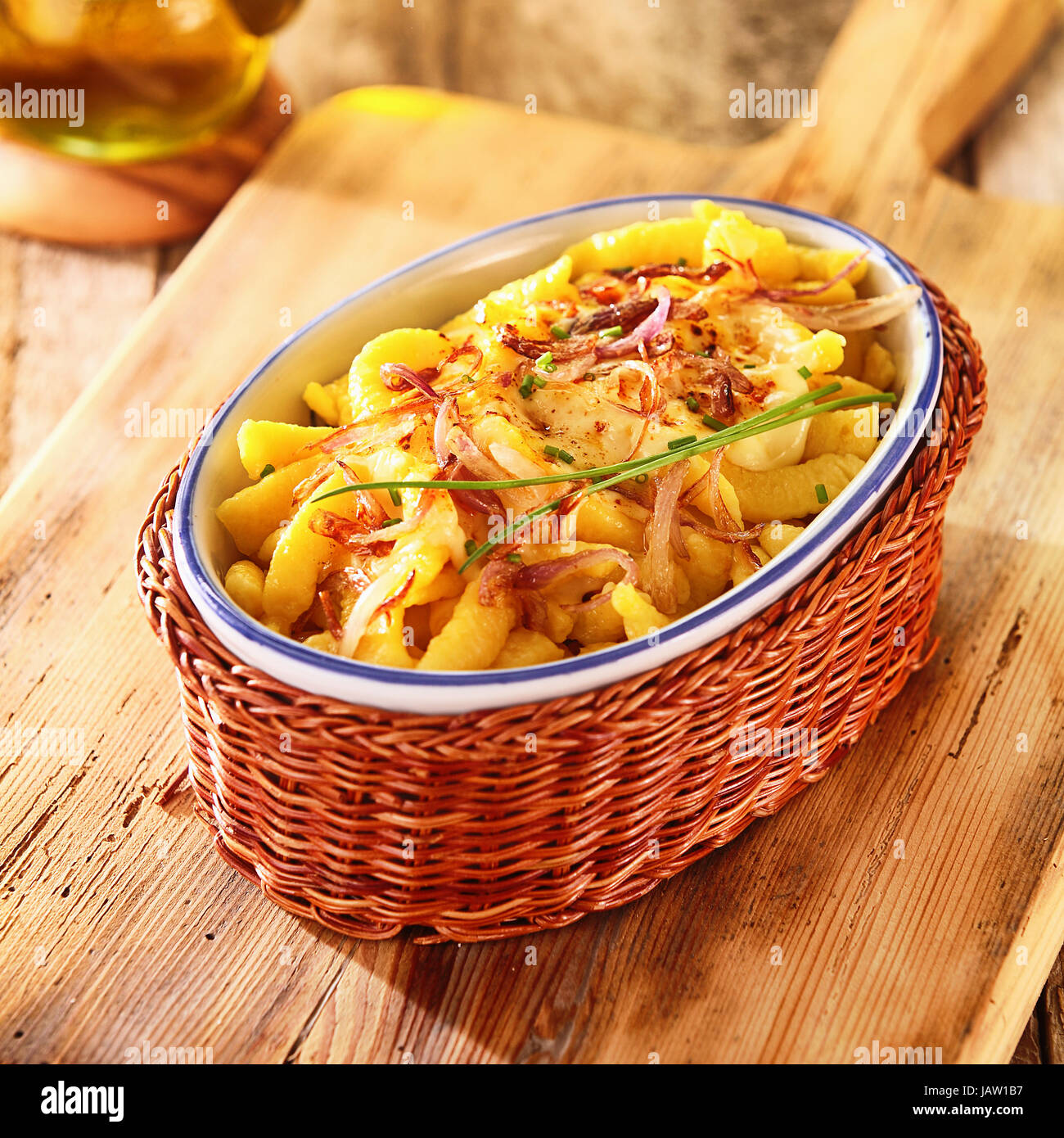 Serving of German spatzle or fried egg noodle dumplings in a rustic