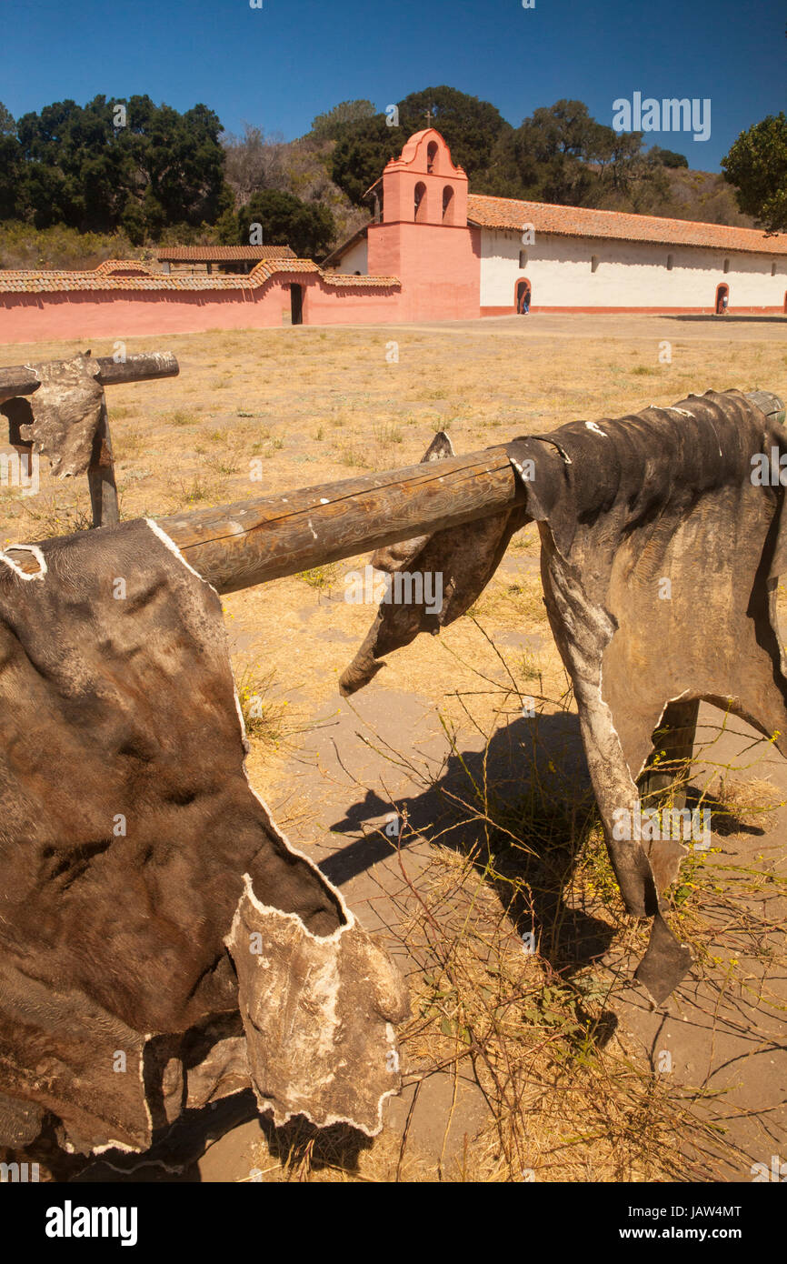 cattle hides dry in front of the bell tower and church, La Purisima Mission State Historic Park, Lompoc, California Stock Photo