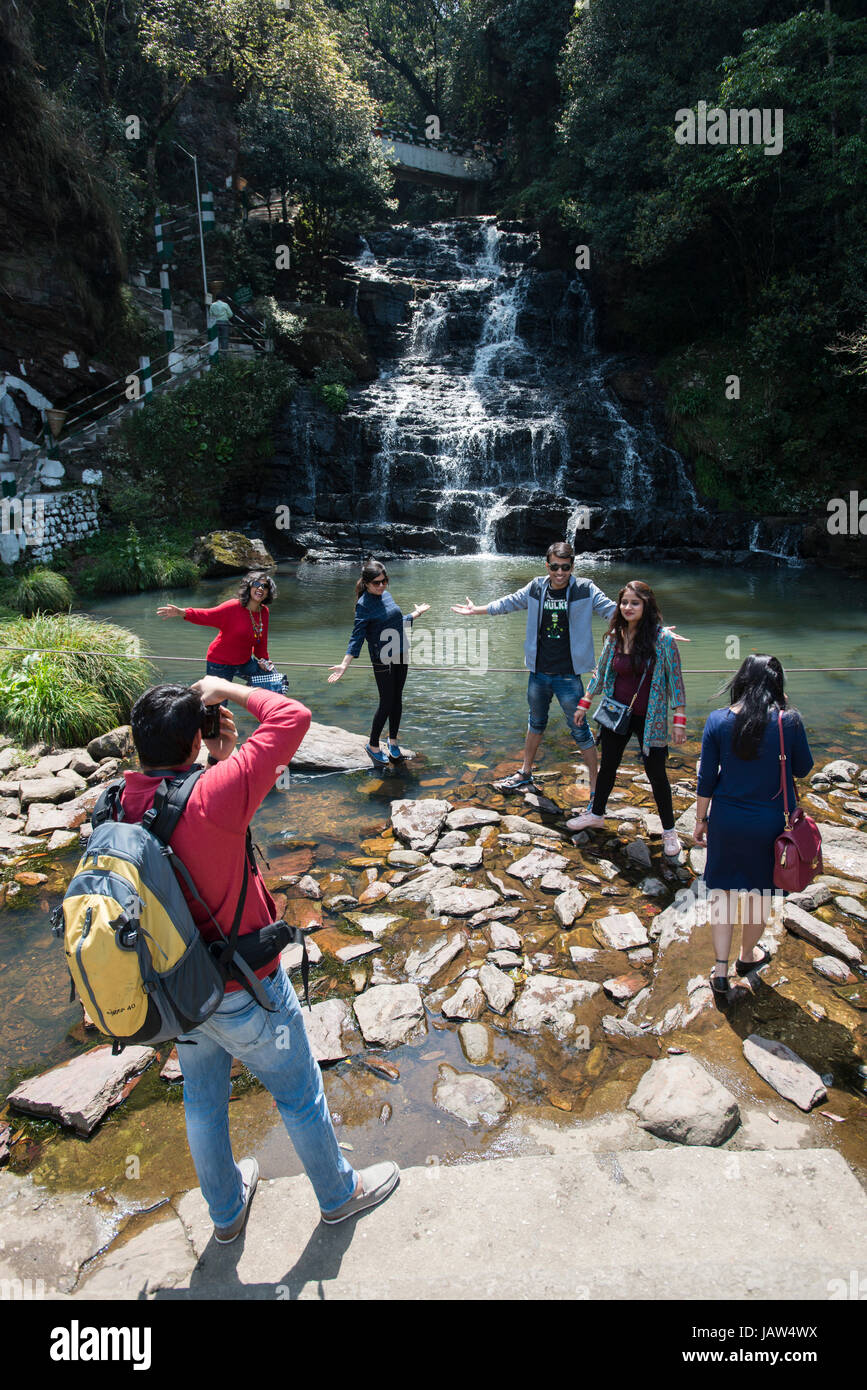Tourists take photos of themselves at Elephant Falls in Meghalaya state, India Stock Photo
