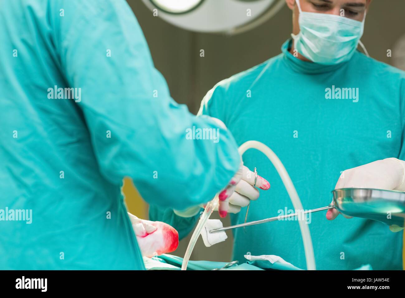 Man wearing surgical mask holding hi-res stock photography and images ...