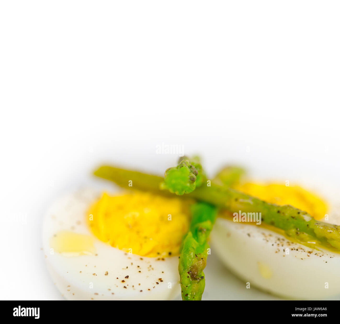 View of boiled fresh green asparagus and eggs with extra virgin olive oil Stock ...