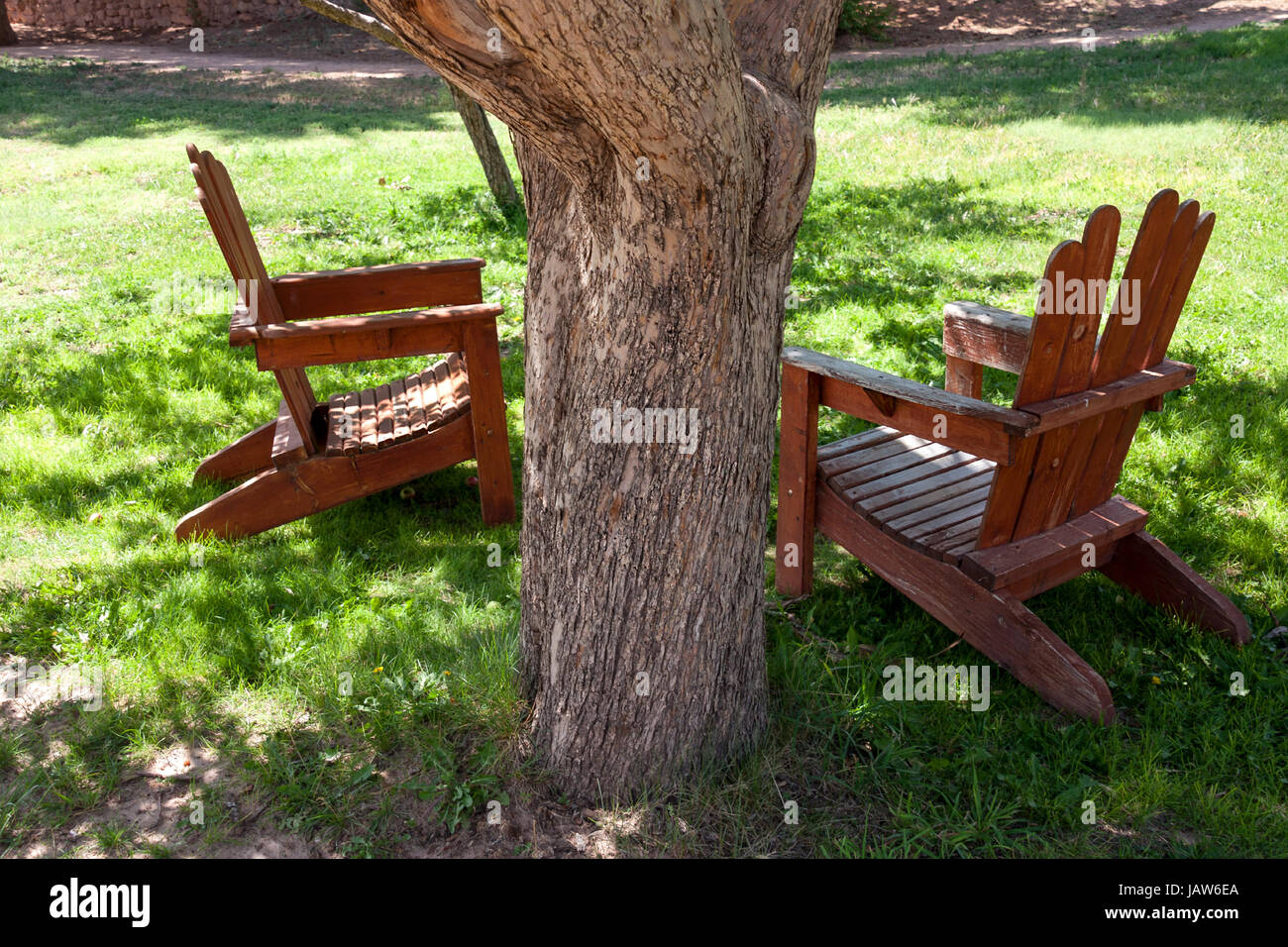 Two wooden chairs facing hi-res stock photography and images - Alamy