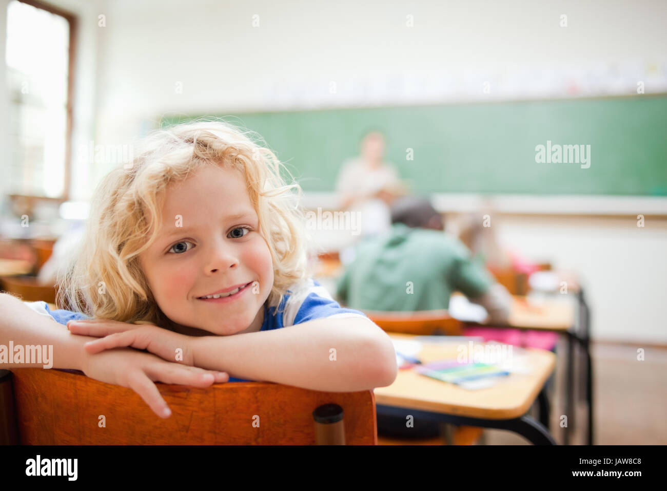 Schoolboy paying attention teacher hi-res stock photography and images ...