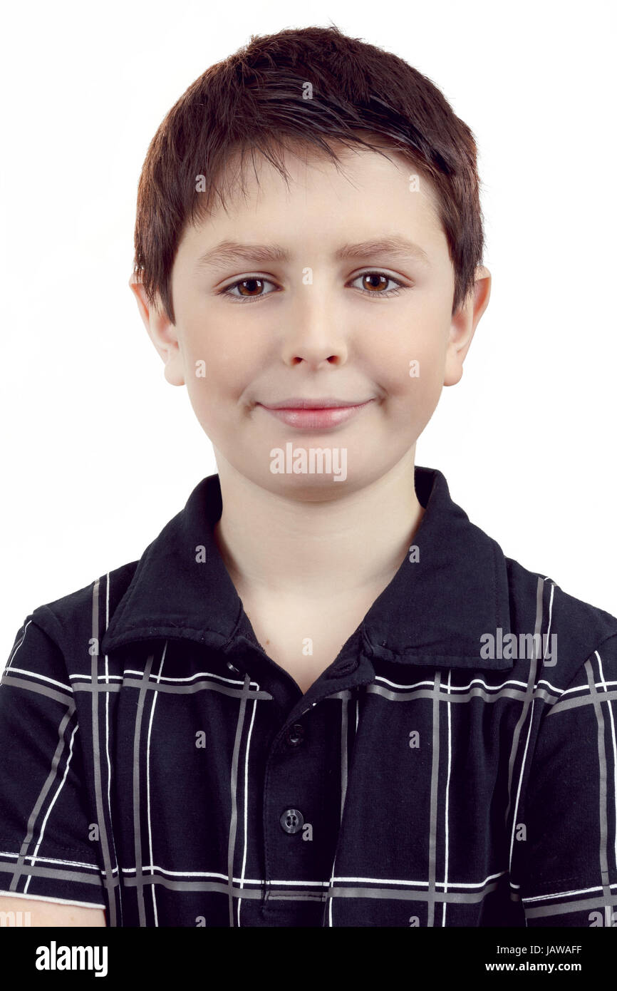 Portrait of a happy smiling young boy against white background Stock ...