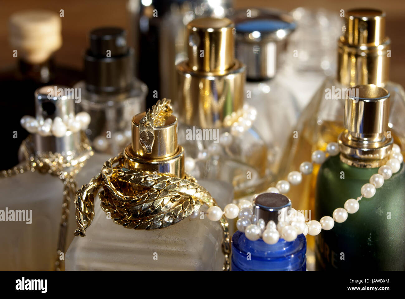 concept of beauty and sensuality; jewelry and perfumes Stock Photo