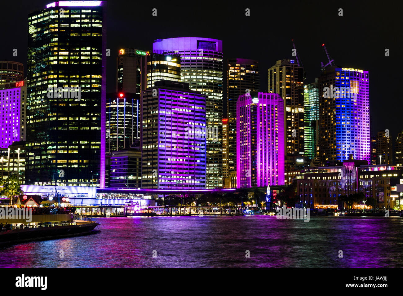 The Sydney skyline illuminated in colourful lights at the Vivid Sydney Festival. Stock Photo