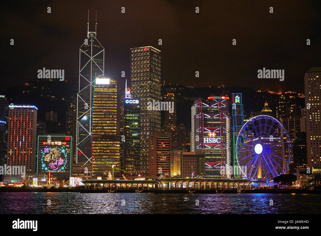 Victoria Harbour, skyscrapers and Hong Kong Observation Wheel, Central, Hong Kong Island, Hong Kong, China Stock Photo