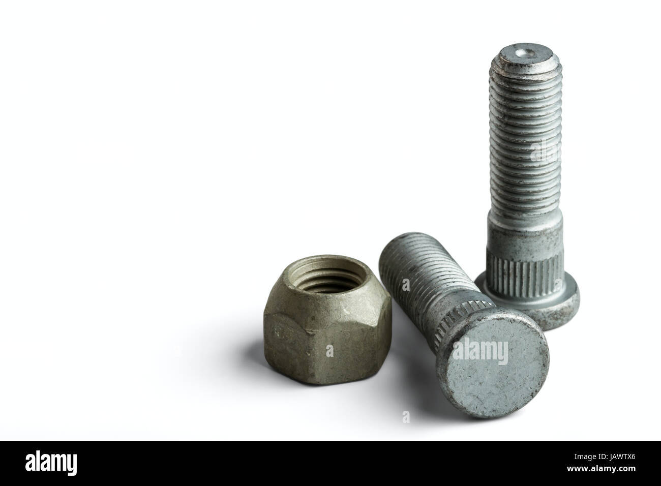 Wheel bolts and nut isolated on a white background Stock Photo - Alamy