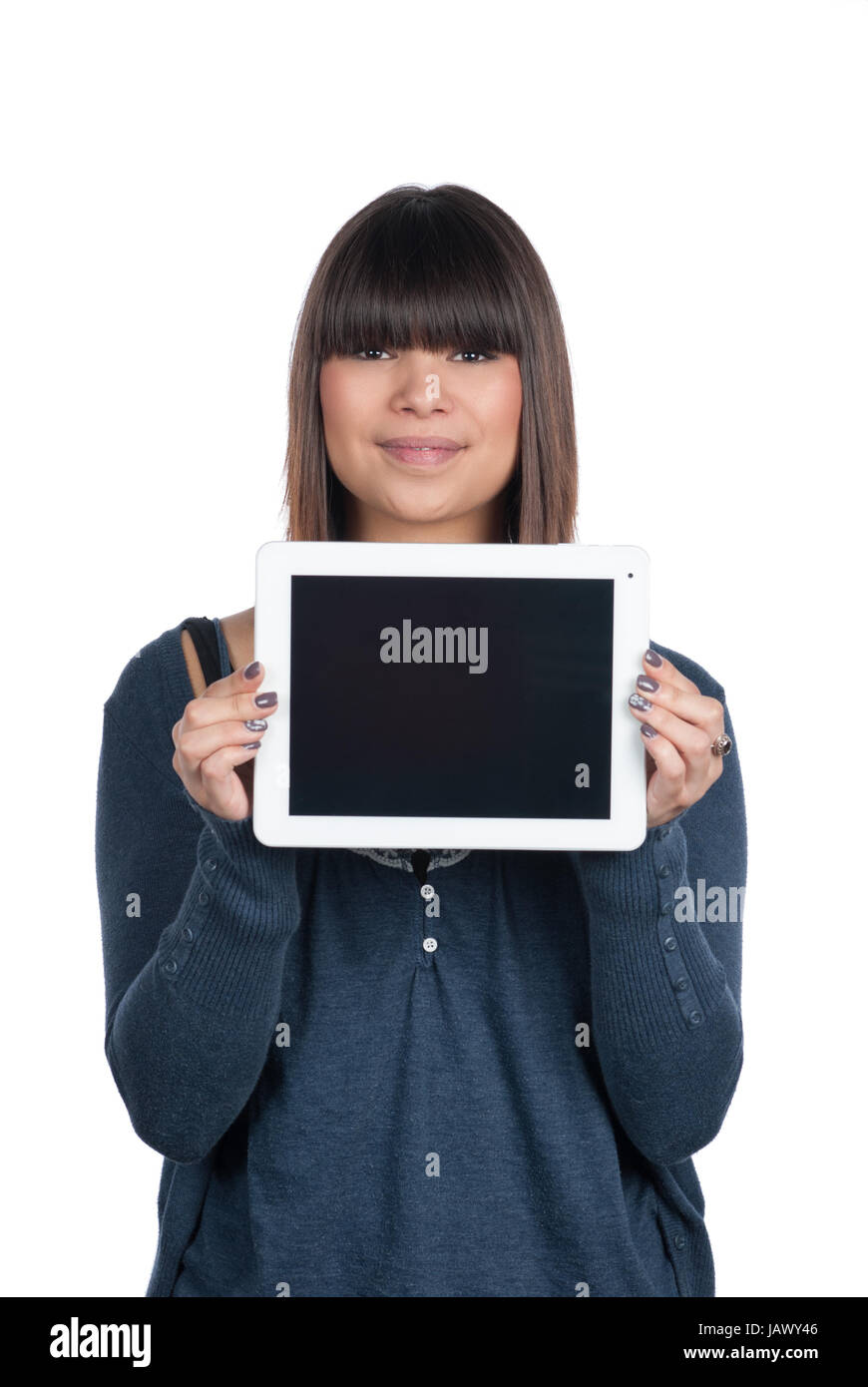 Freigestelltes Foto einer jungen Frau, die ein Tablet zeigt, wobei sie dieses waagerecht hält Stock Photo