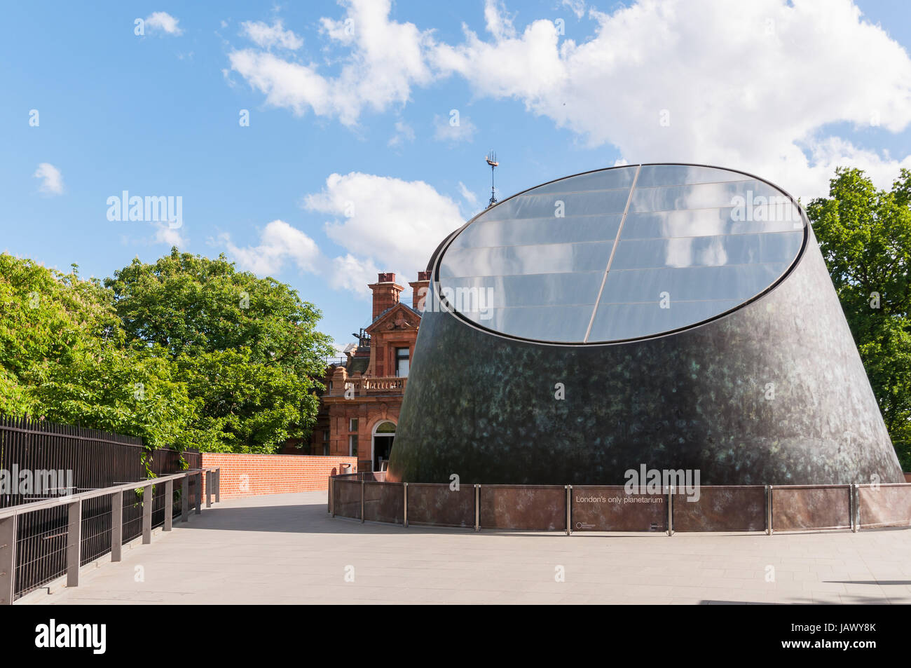 London, United Kingdom - May 9, 2011: Building of the Peter Harrison Planetarium. It is a 120-seat digital laser planetarium, situated in Greenwich Park, London and is part of the National Maritime Museum. Stock Photo