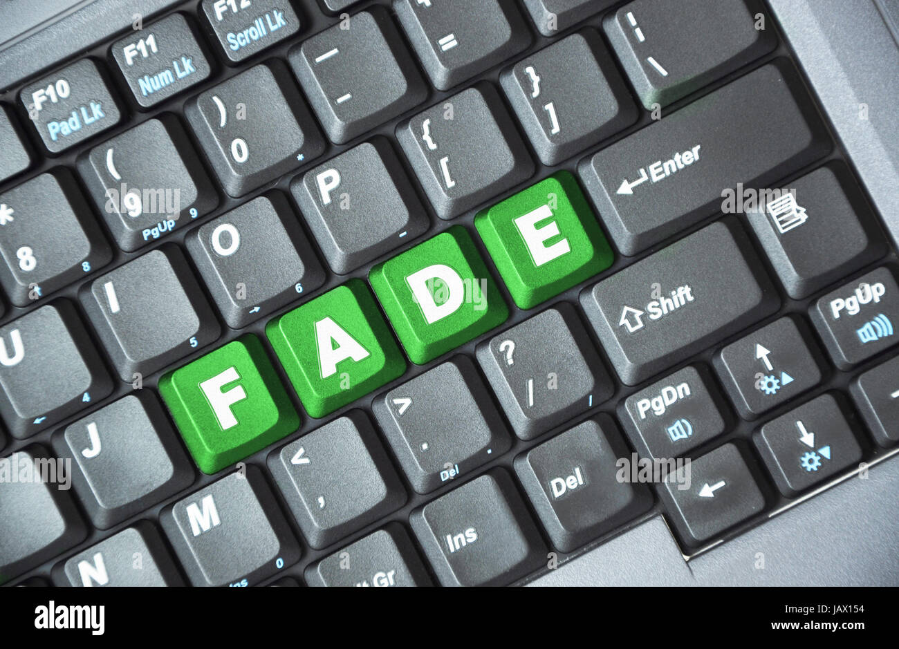 Green fade key on keyboard Stock Photo Alamy