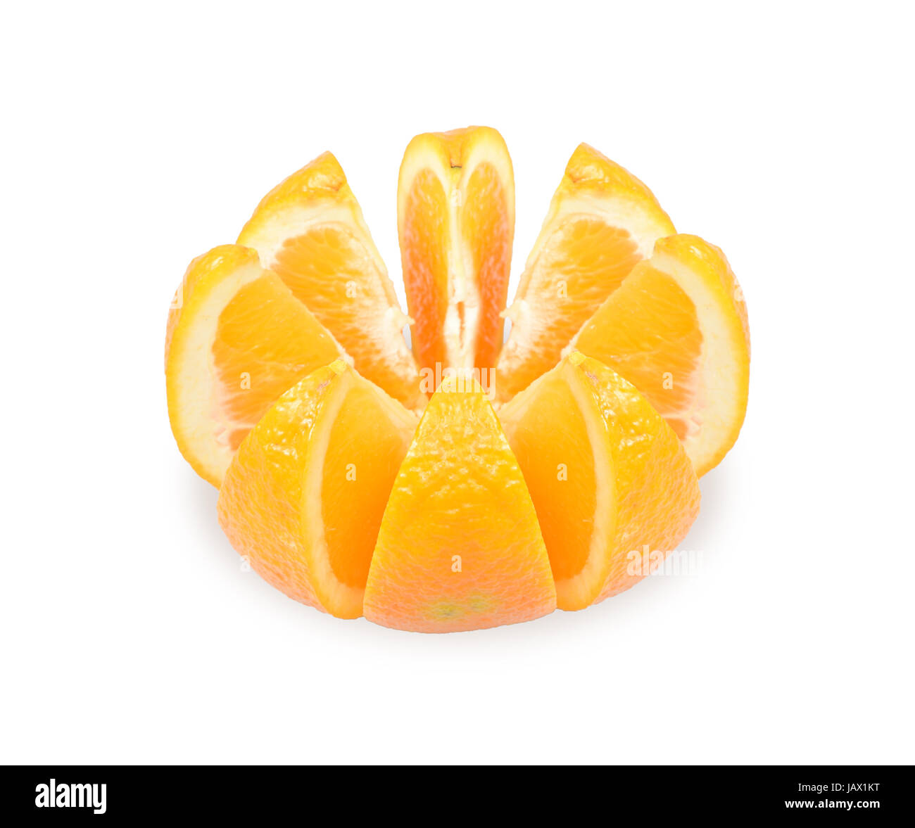 ripe orange cut in slices on a white background Stock Photo