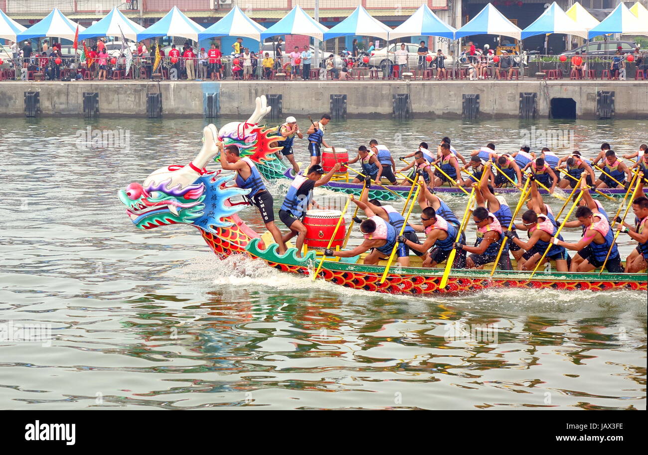 LINYUAN, TAIWAN -- MAY 28, 2017: Two unidentified teams compete in the Dragon Boat Races at Zhongyun Fishing Port in Taiwan. Stock Photo