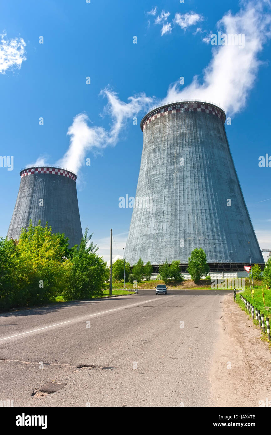 Industrial smoke rising from Power Station Cooling Towers Stock Photo ...