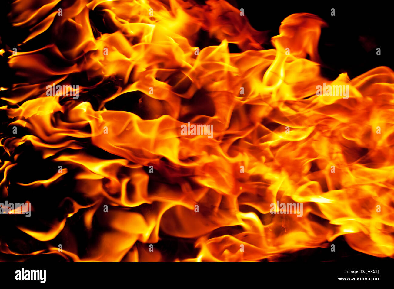 Beautiful yellow and orange hot fire on black background Stock Photo ...