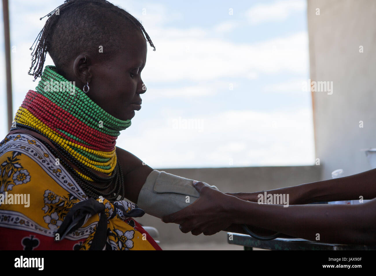 A woman attends a health clinic, rural Kenya, Africa. Stock Photo