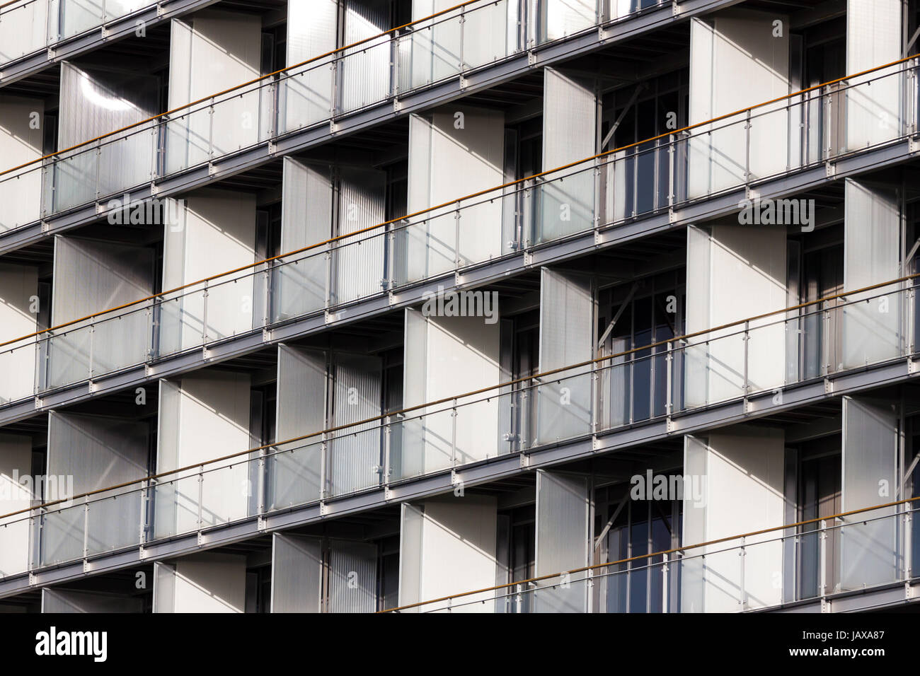 Regular structure of windows and balconies - modern building Stock ...