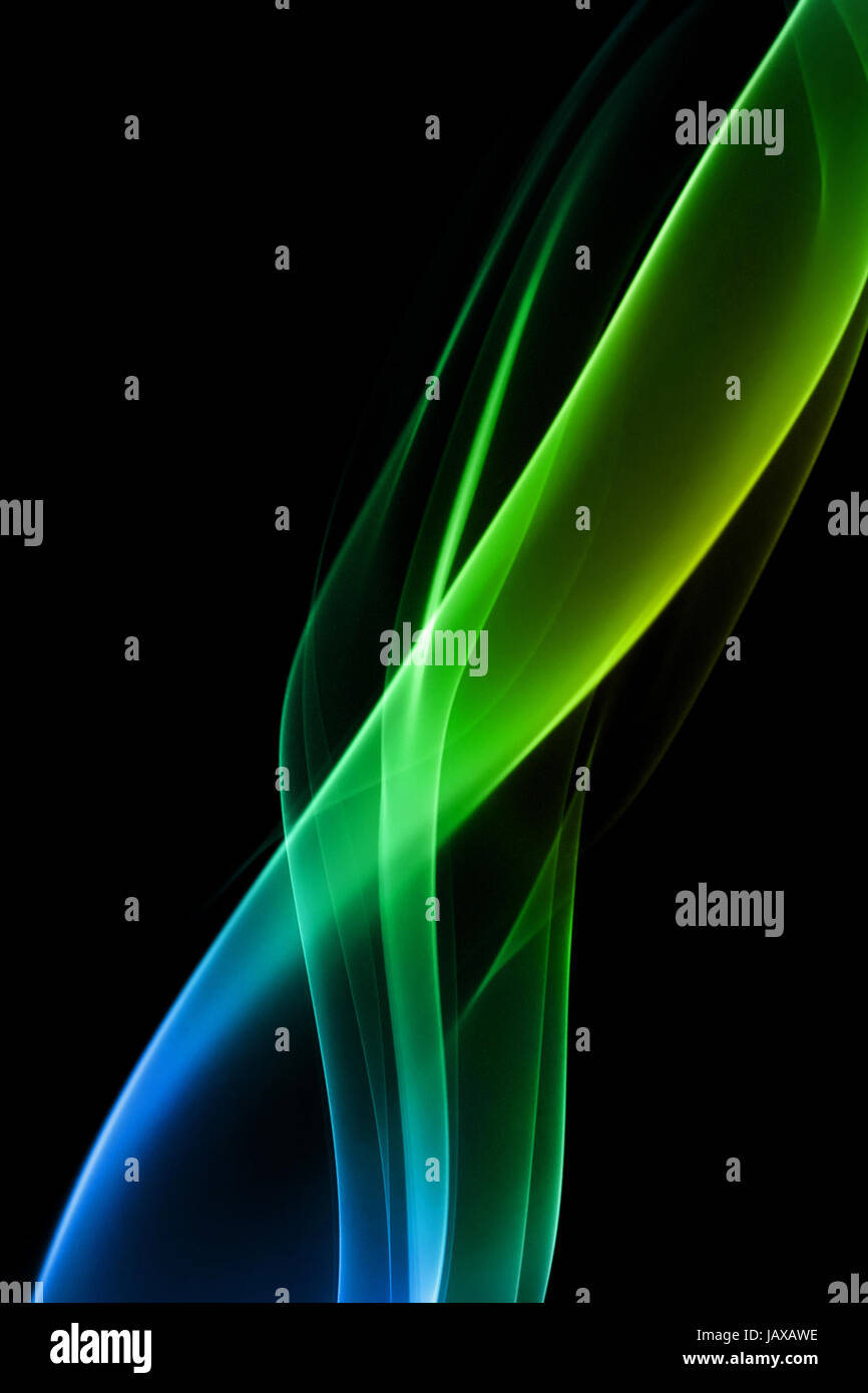 green and blue smoke on black background Stock Photo - Alamy