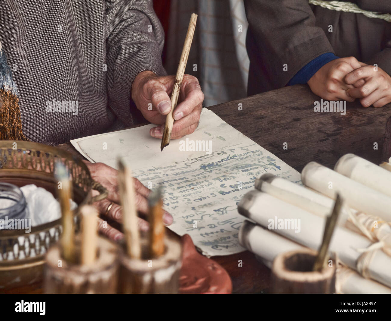 scribal, writing with a reed pen Stock Photo Alamy