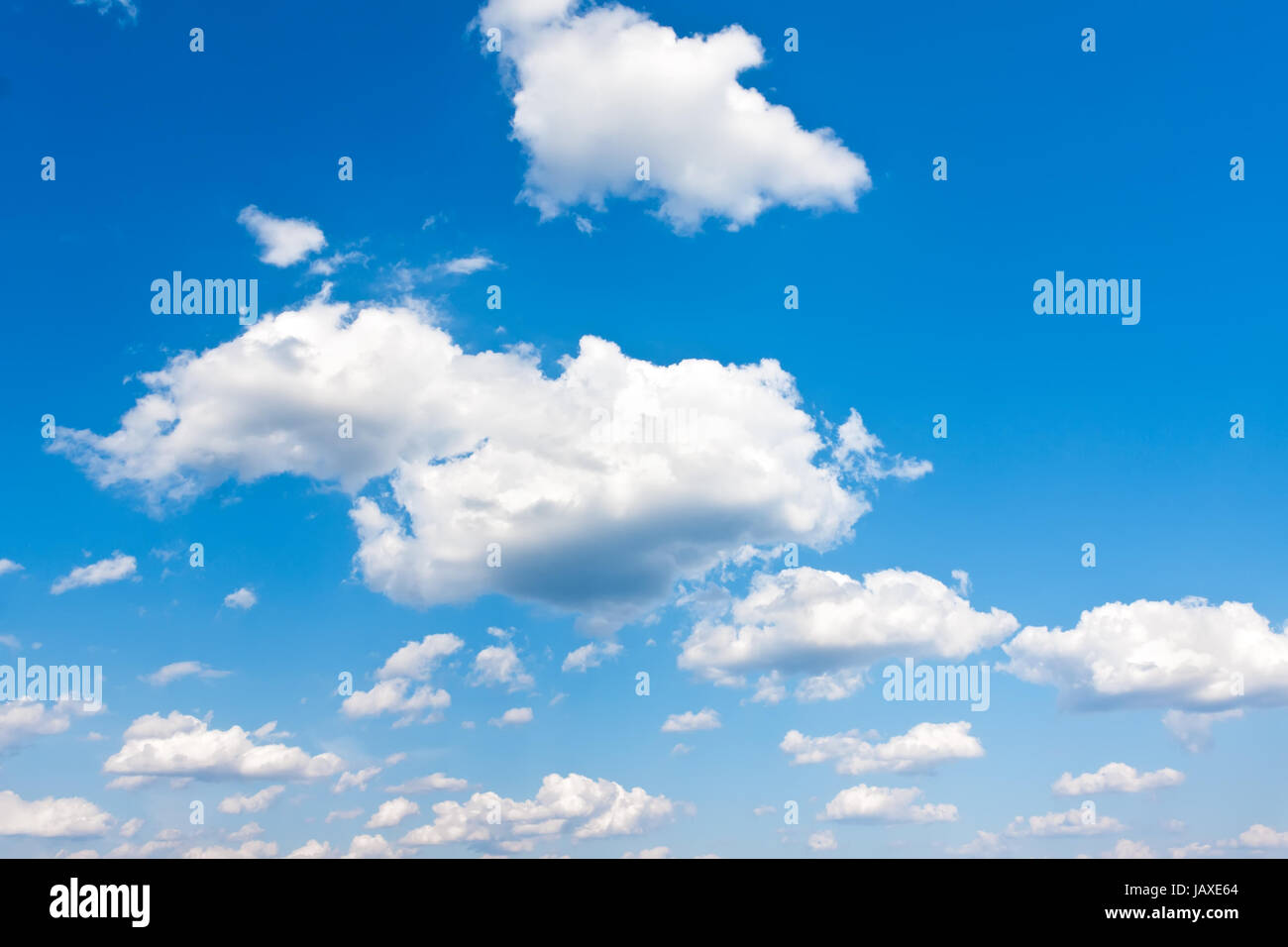 White clouds in blue summer sky background Stock Photo - Alamy