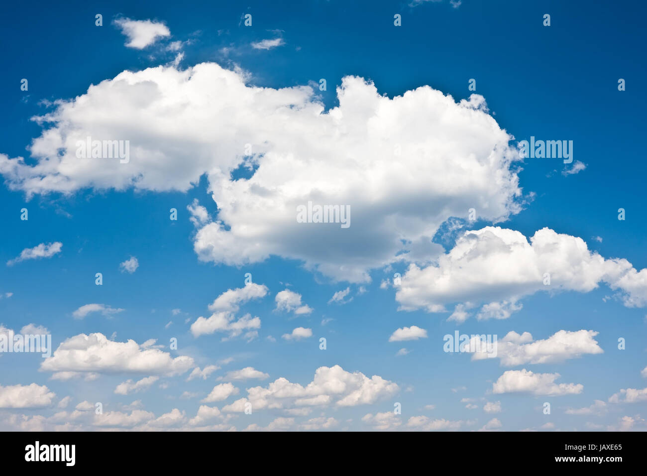 White clouds in blue summer sky background Stock Photo - Alamy
