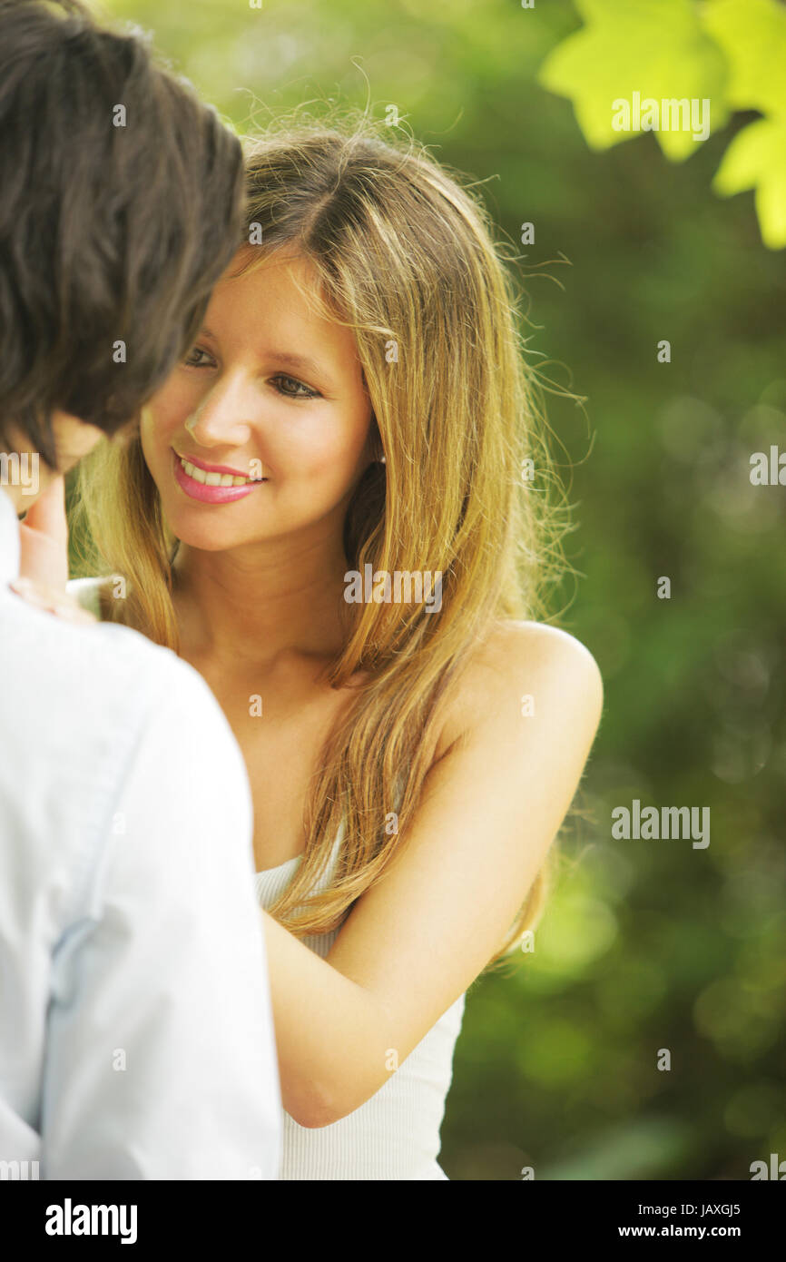 a young couple in love having fun in the park Stock Photo - Alamy