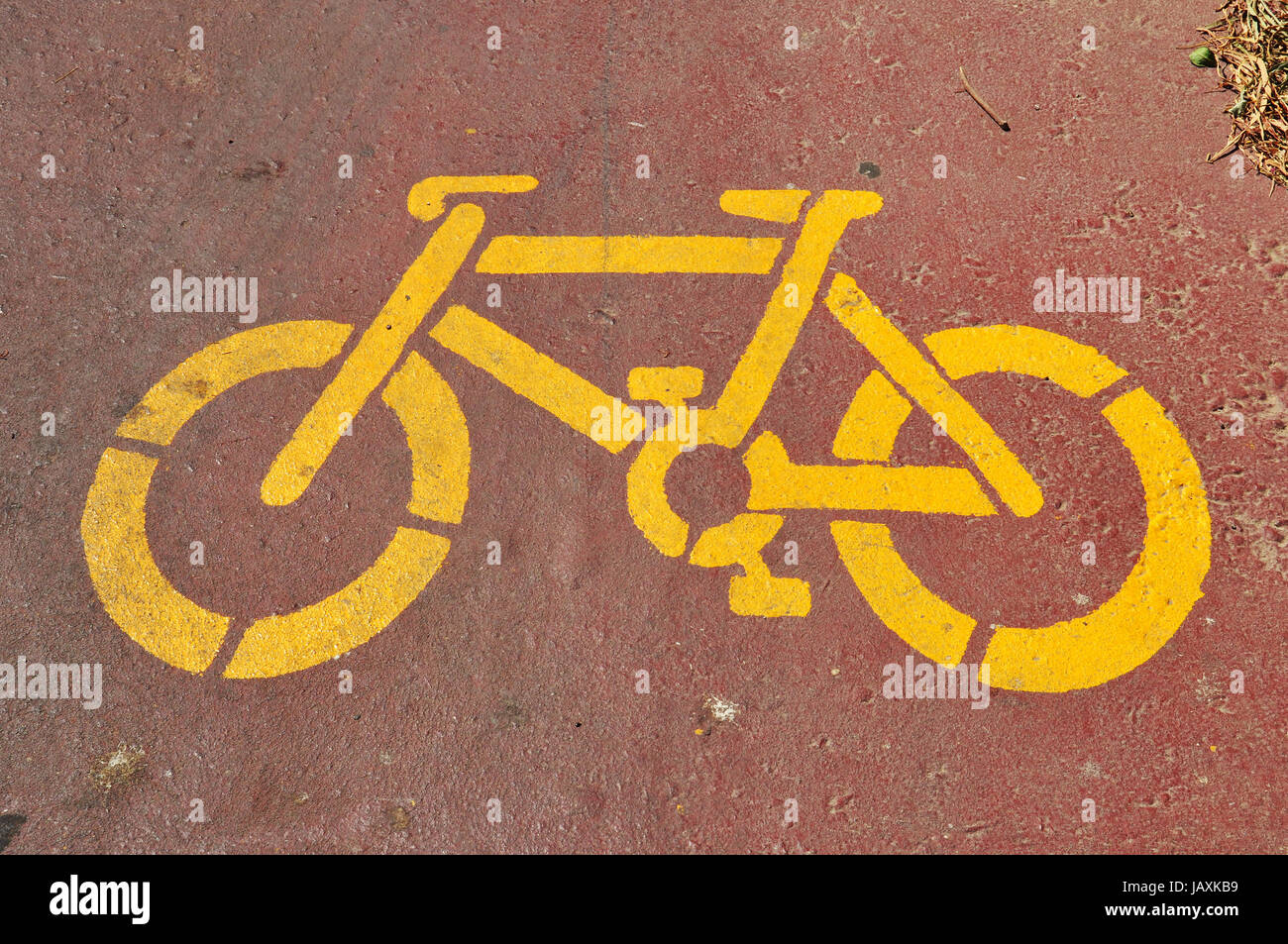 Bicycle sign stencil on bike lane abstract sports background Stock