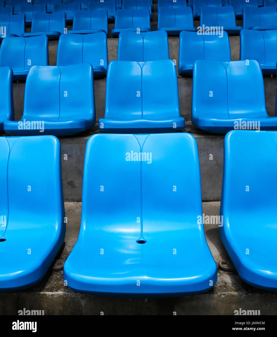 Blue stadium seats Stock Photo - Alamy