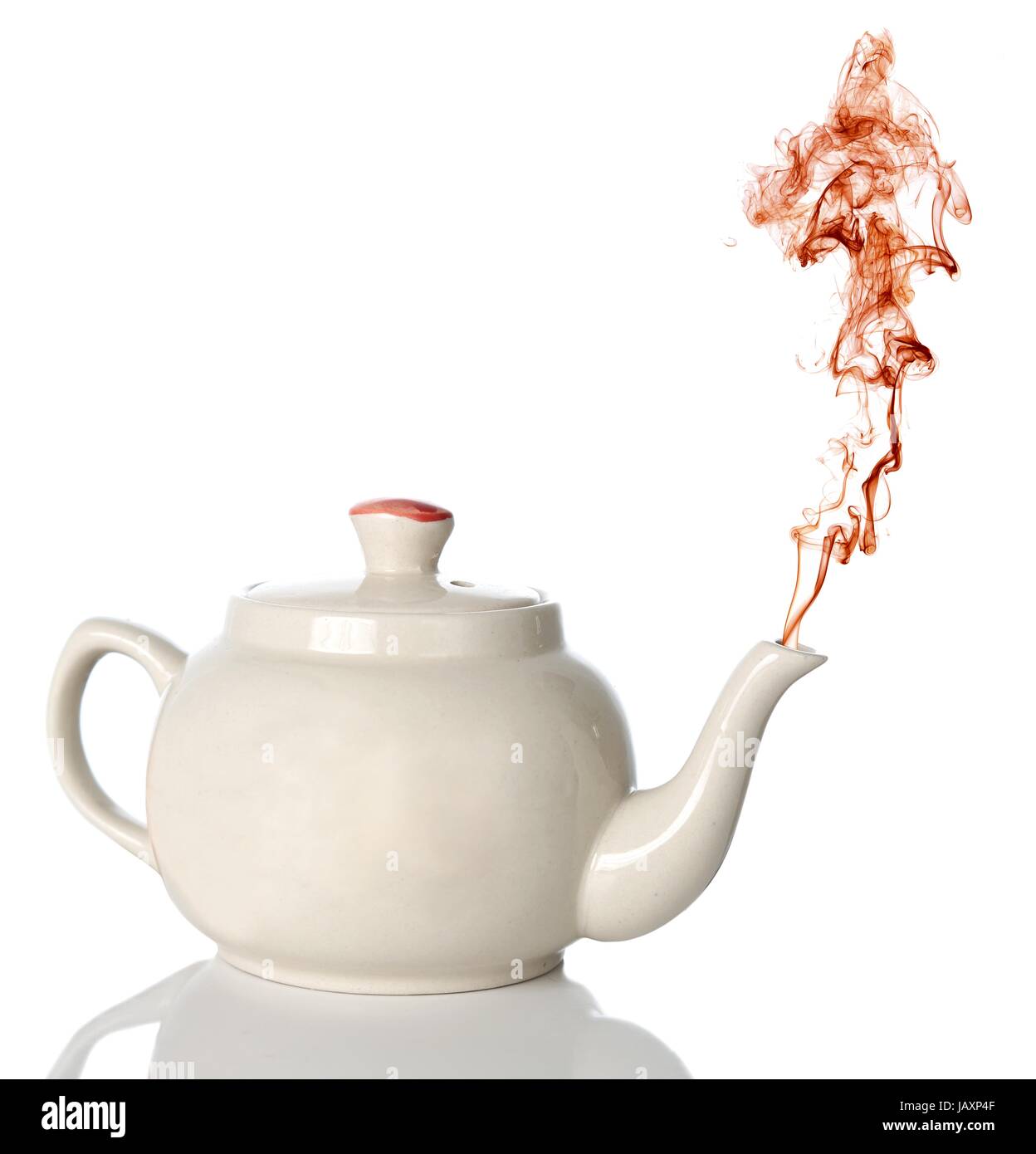 White ceramic tea-pot with color steam coming out of the spout ...